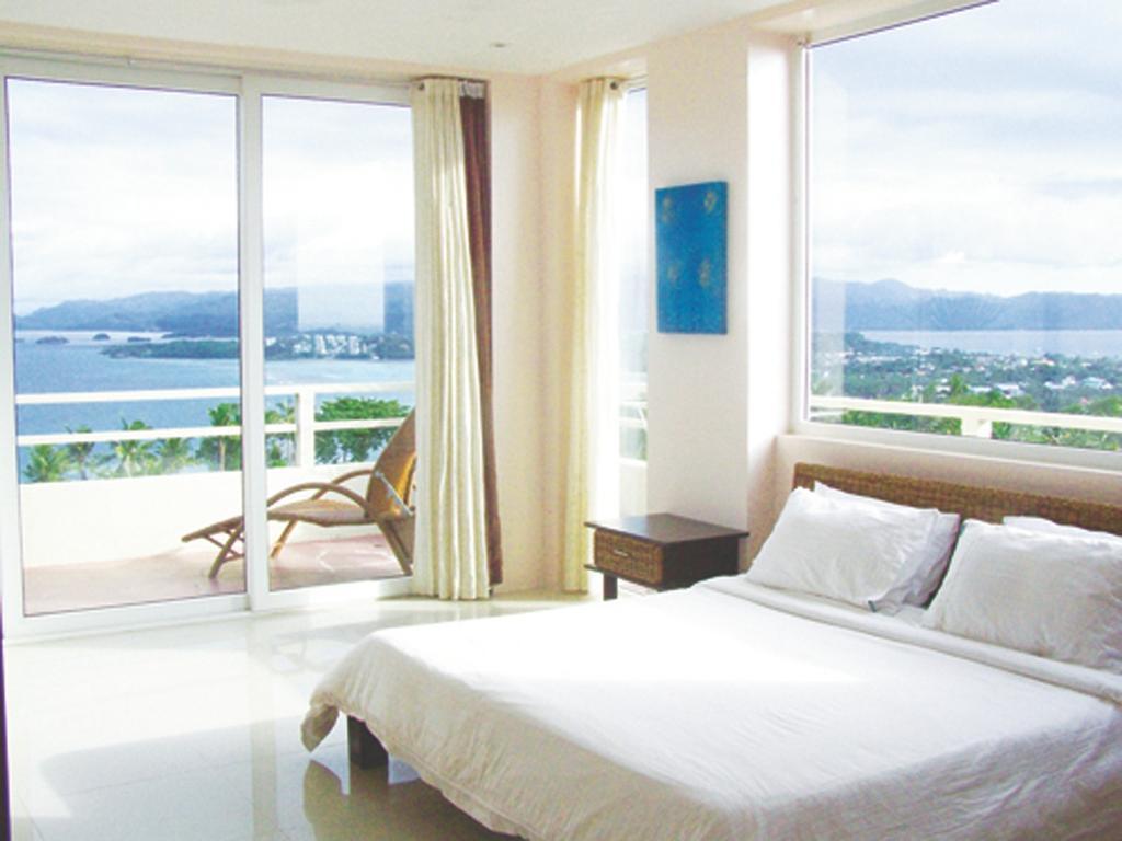 Tanawin Resort And Luxury Apartments Катиклан Экстерьер фото